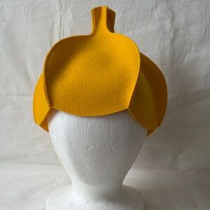 Handmade wool felt beret hat .